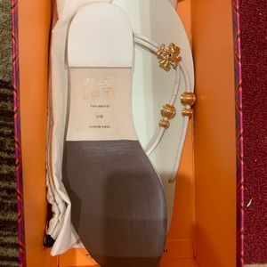 Gleaming beads and iconic Tory Burch hardware